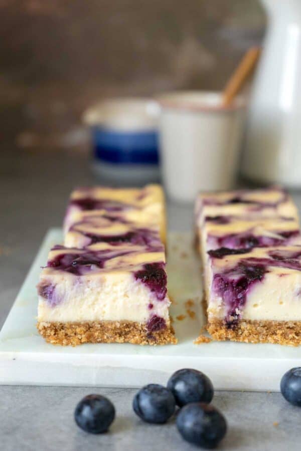 Blueberry Swirl Cheesecake Bars - El Mundo Eats