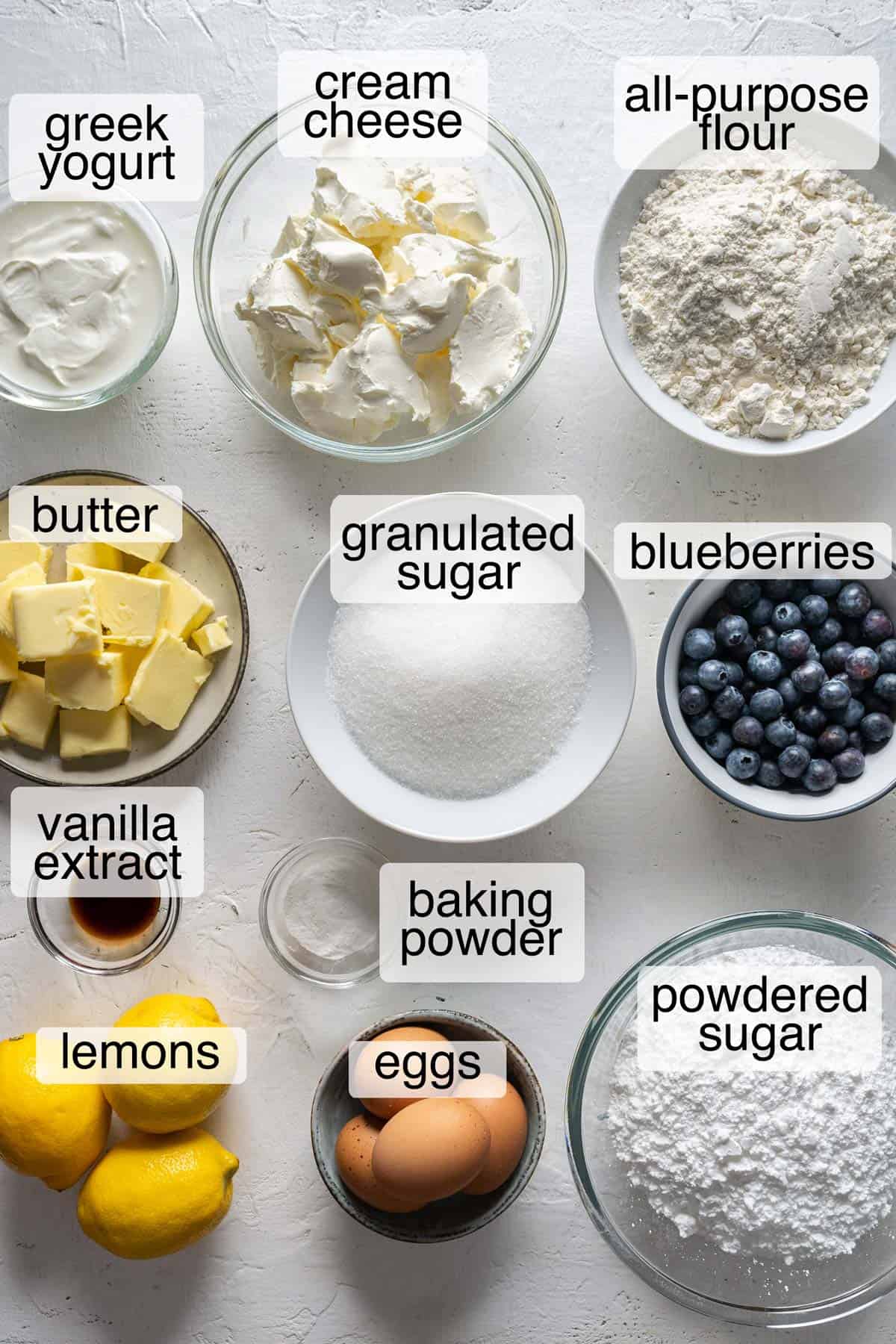 Ingredients to make lemon blueberry cake.