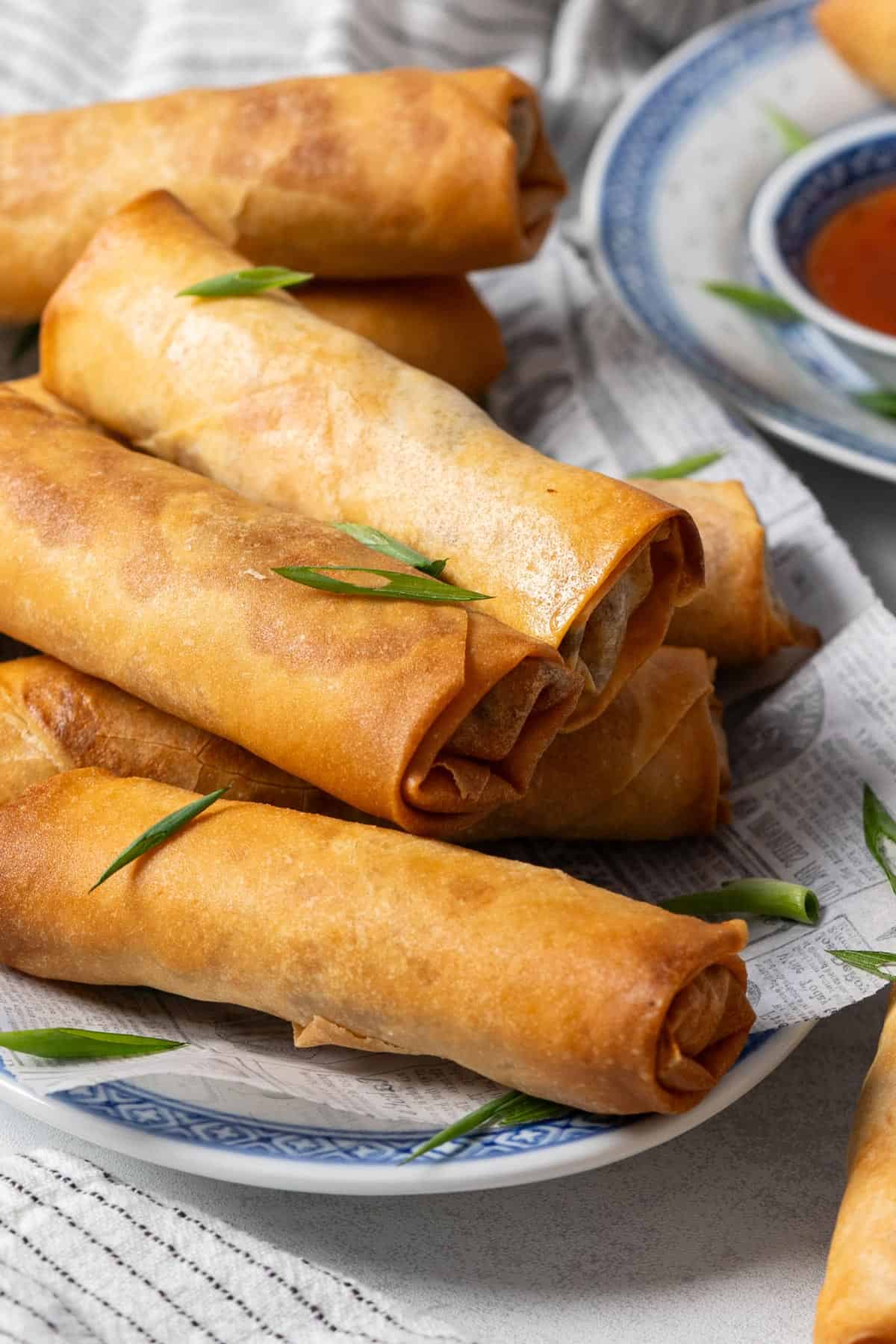 Some spring rolls on a plate.