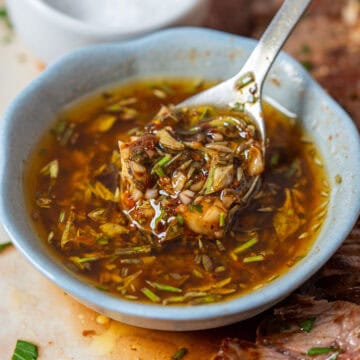 Authentic Argentine chimichurri served in a small bowl.