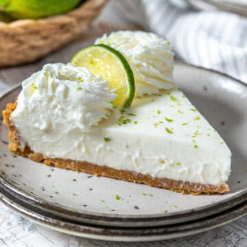 Key lime pie on a plate.