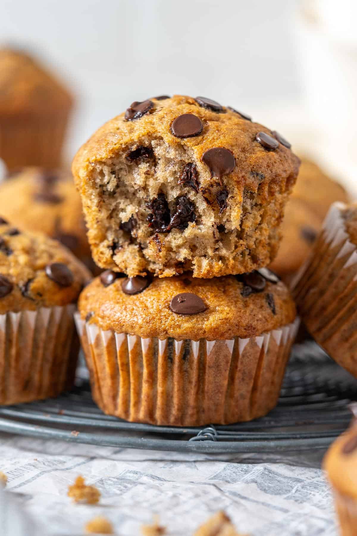 Banana and chocolate chip muffins stacked.