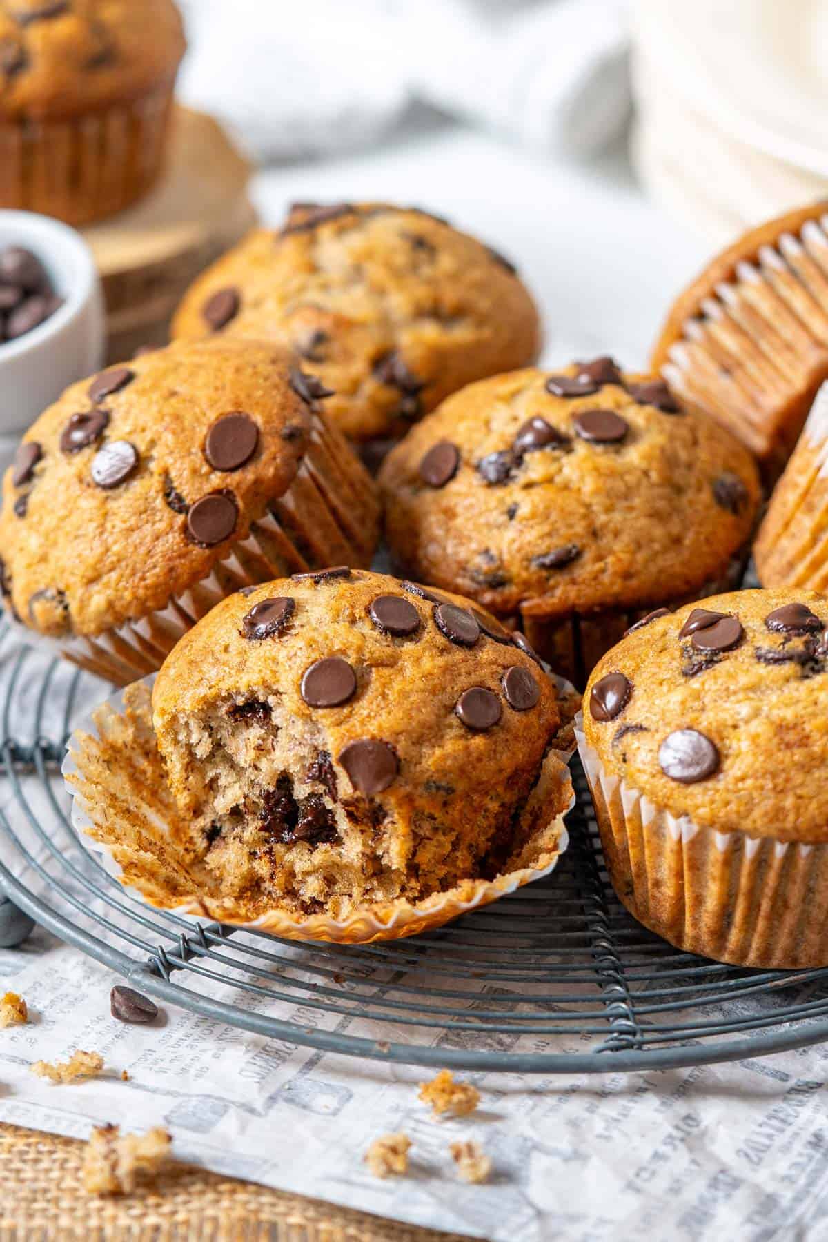 Banana and chocolate chip muffins on a cooling rack.