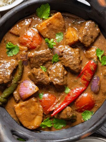 A beef stew served on a bowl.