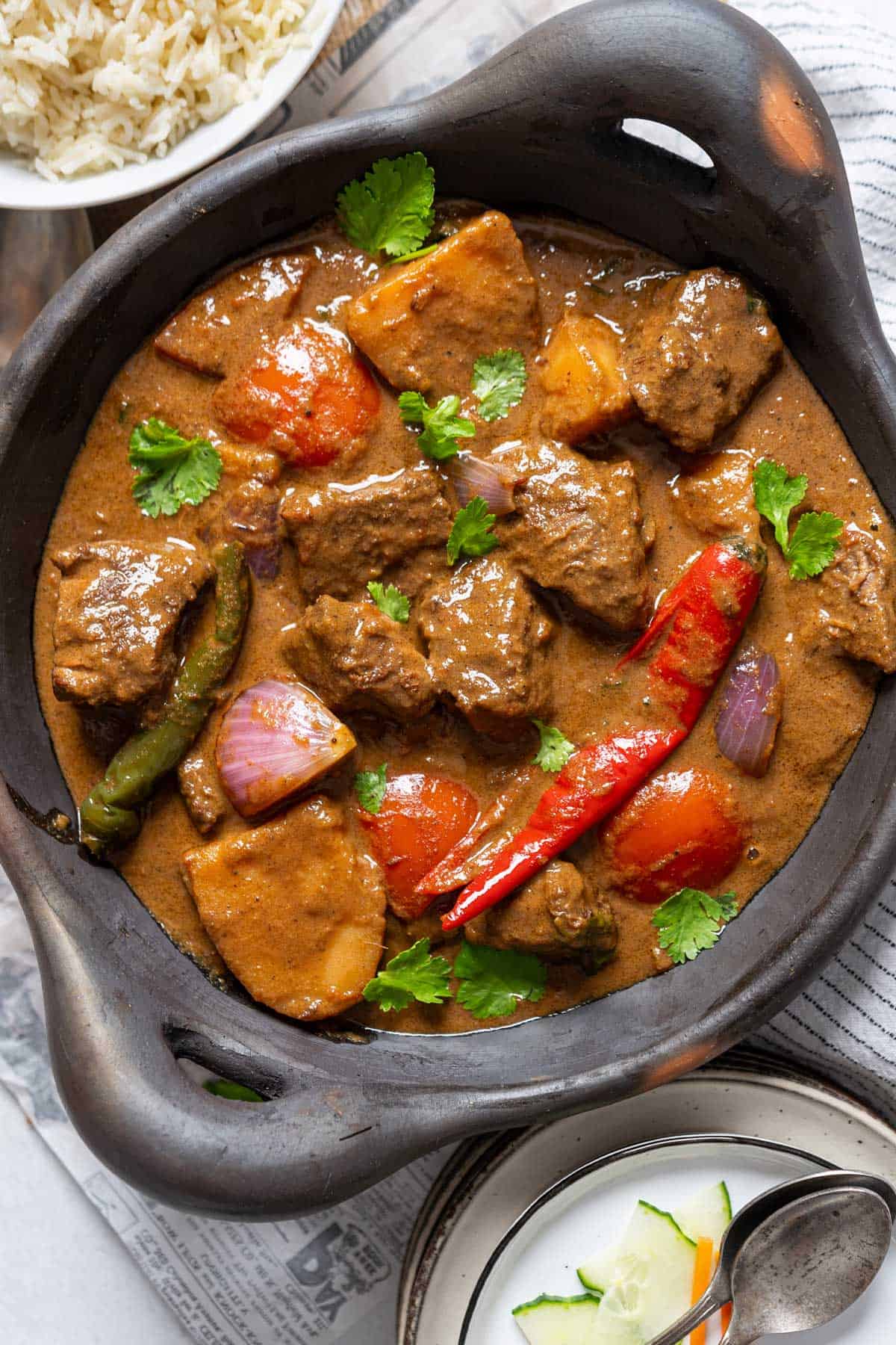 Beef korma curry in a big serving bowl.