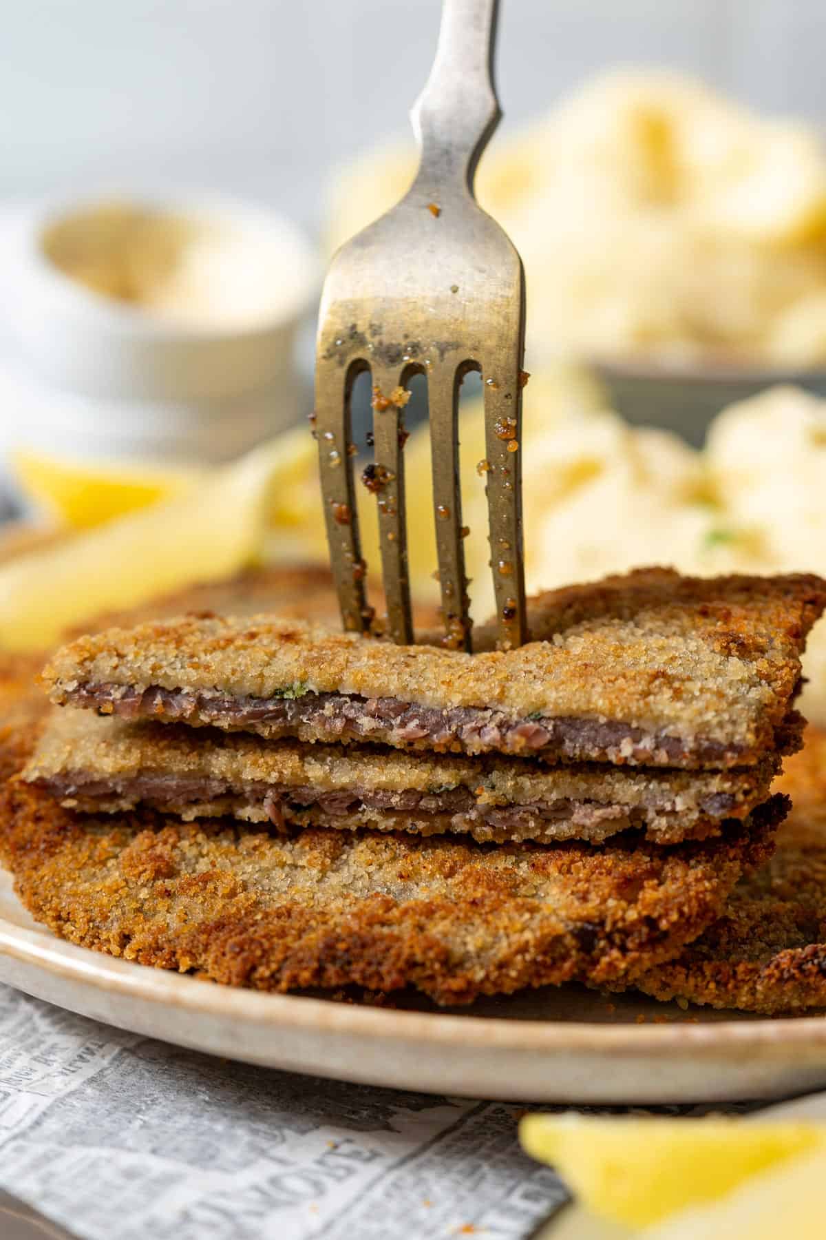 Close up of the inside texture of milanesa argentina.