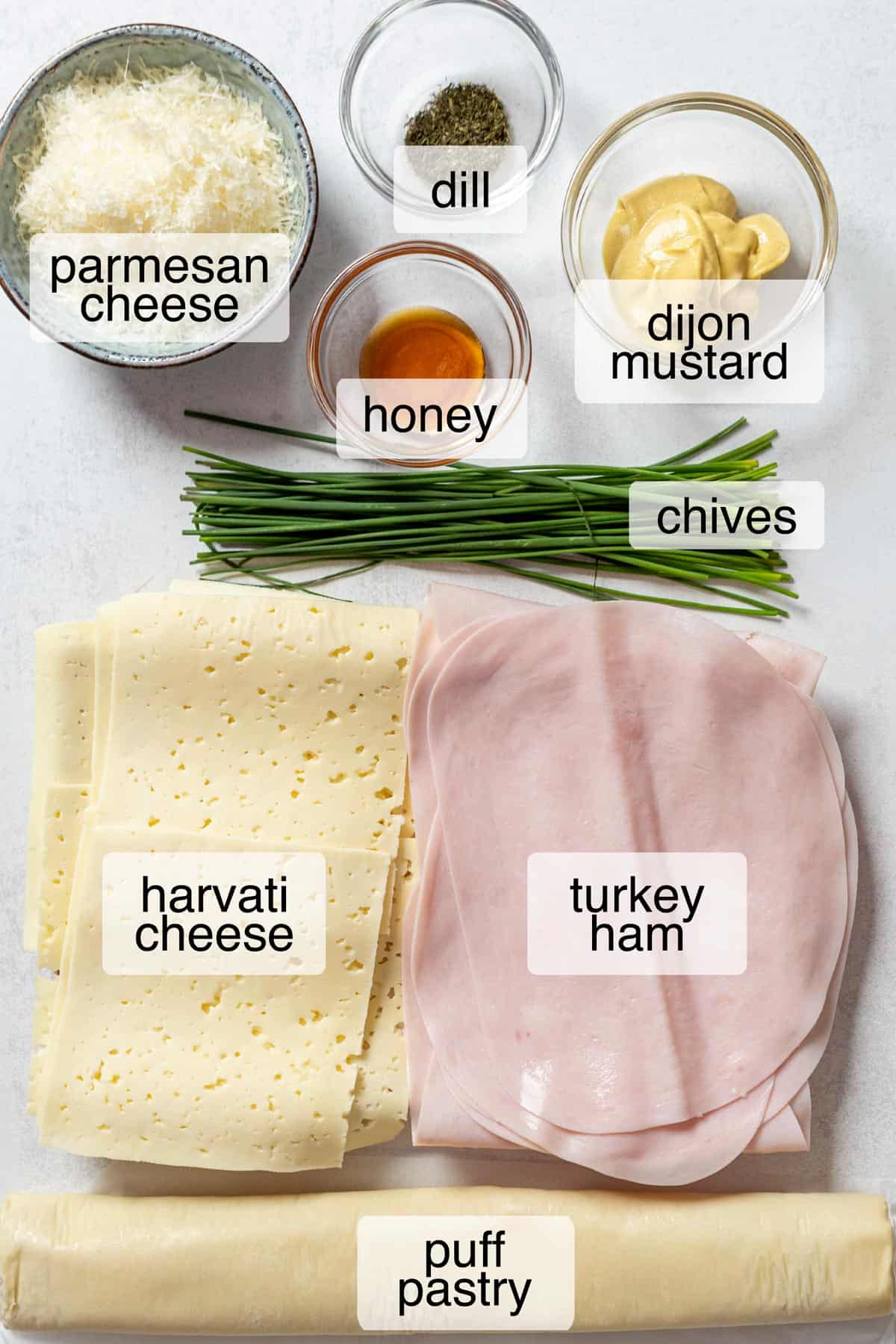 Ingredients to make turkey ham and cheese puff pastry pinwheels.